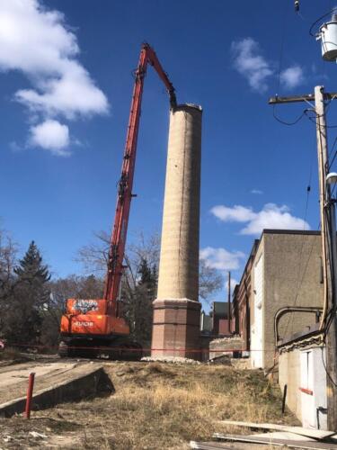 Apr 23 High Reach Demolition of Chimney/Smokestack