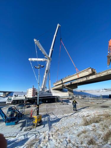 February 18, 2021 - First Girder Lifted Off Trans Canada Highway #1, Westbound Lanes Above Railroad Tracks